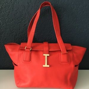 Lovely purse from Isaac Mizrahi New York, bright red, leather.